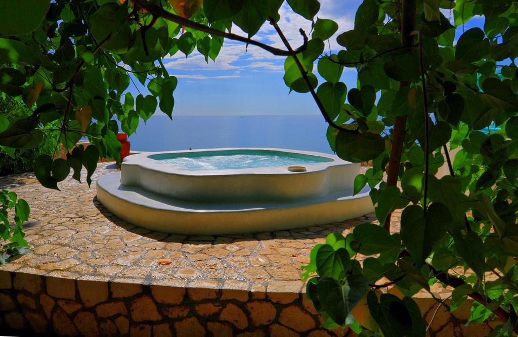 Hotel The Caves Negril Esterno foto